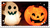 a stamp with a dark background with several little white sparkles around the borders. the focus of the image is of a white glowing ghost with a goofy face, and a orange glowing pumpkin beside it, glowing with it as well with a happy expression